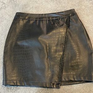Super cute faux leather mini skirt! New with tags!